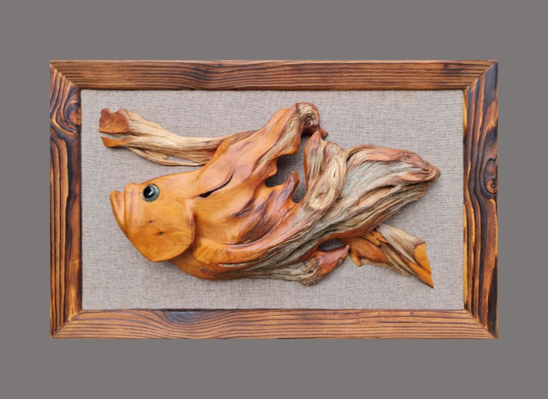 Настенное панно с фигурой рыбы из фрагмента ствола погибшего казацкого можжевельника.